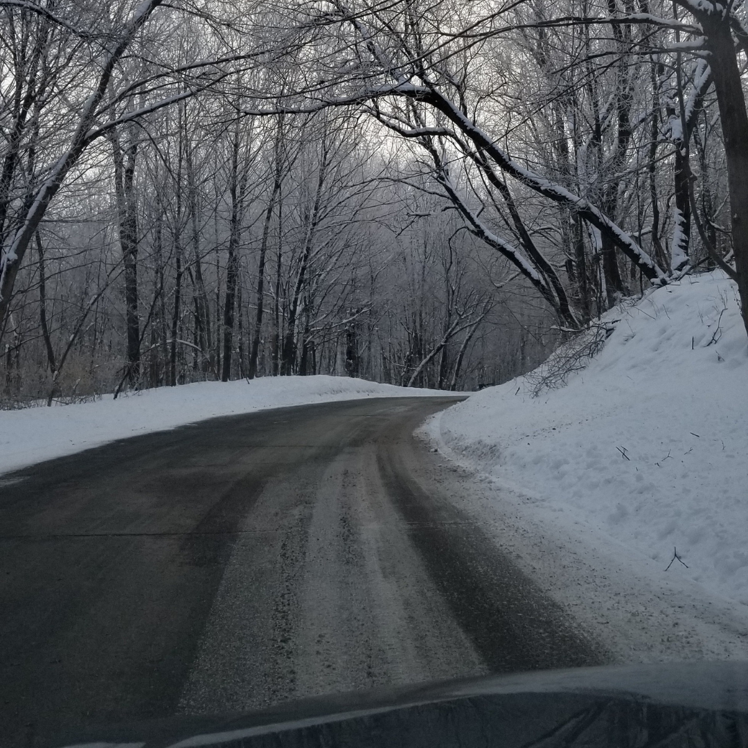 Driving to a winter cabin snowy road