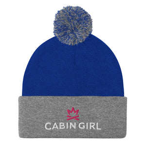 cuffed royal blue pom beanie with pink embroidered logo